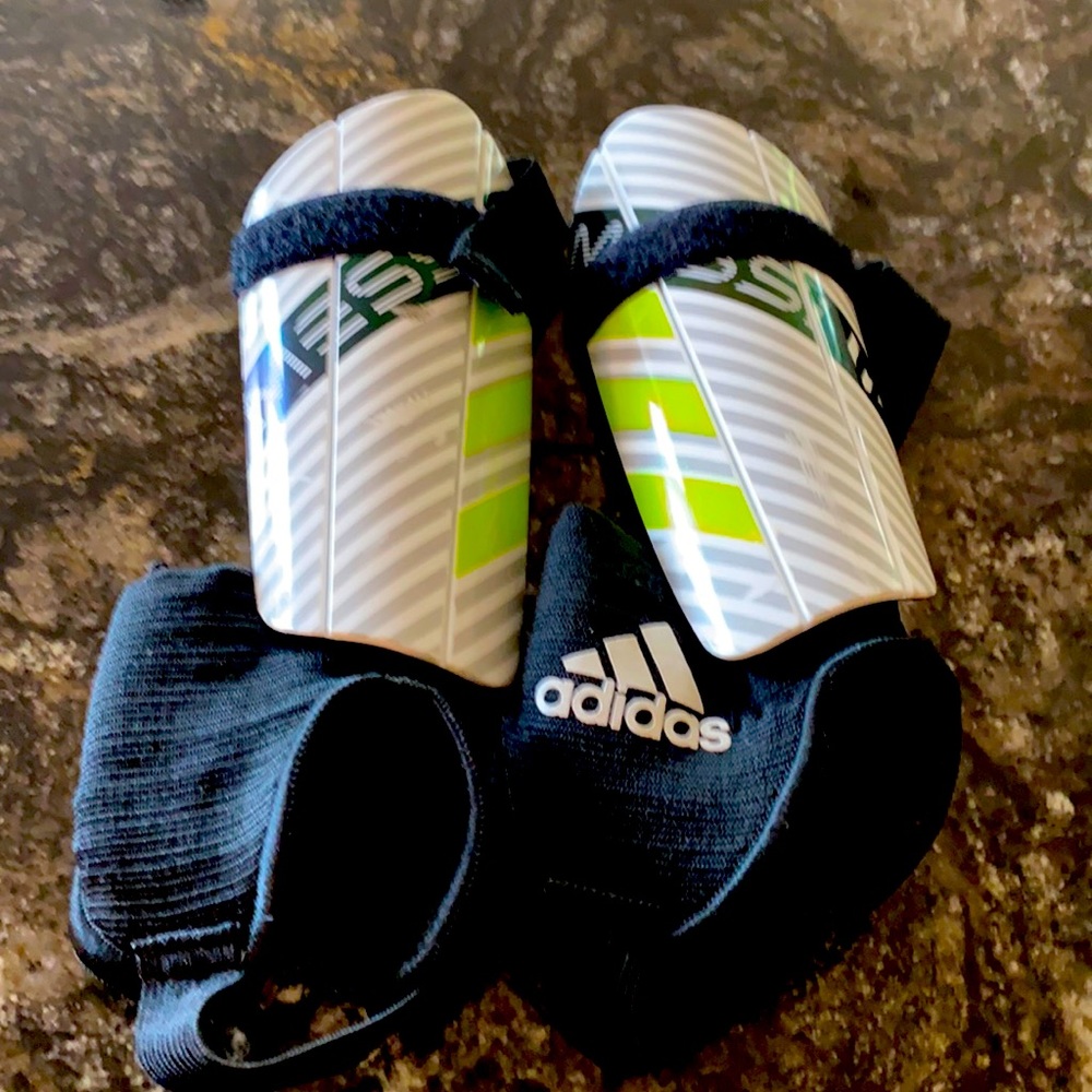Adidas size small shin gards.